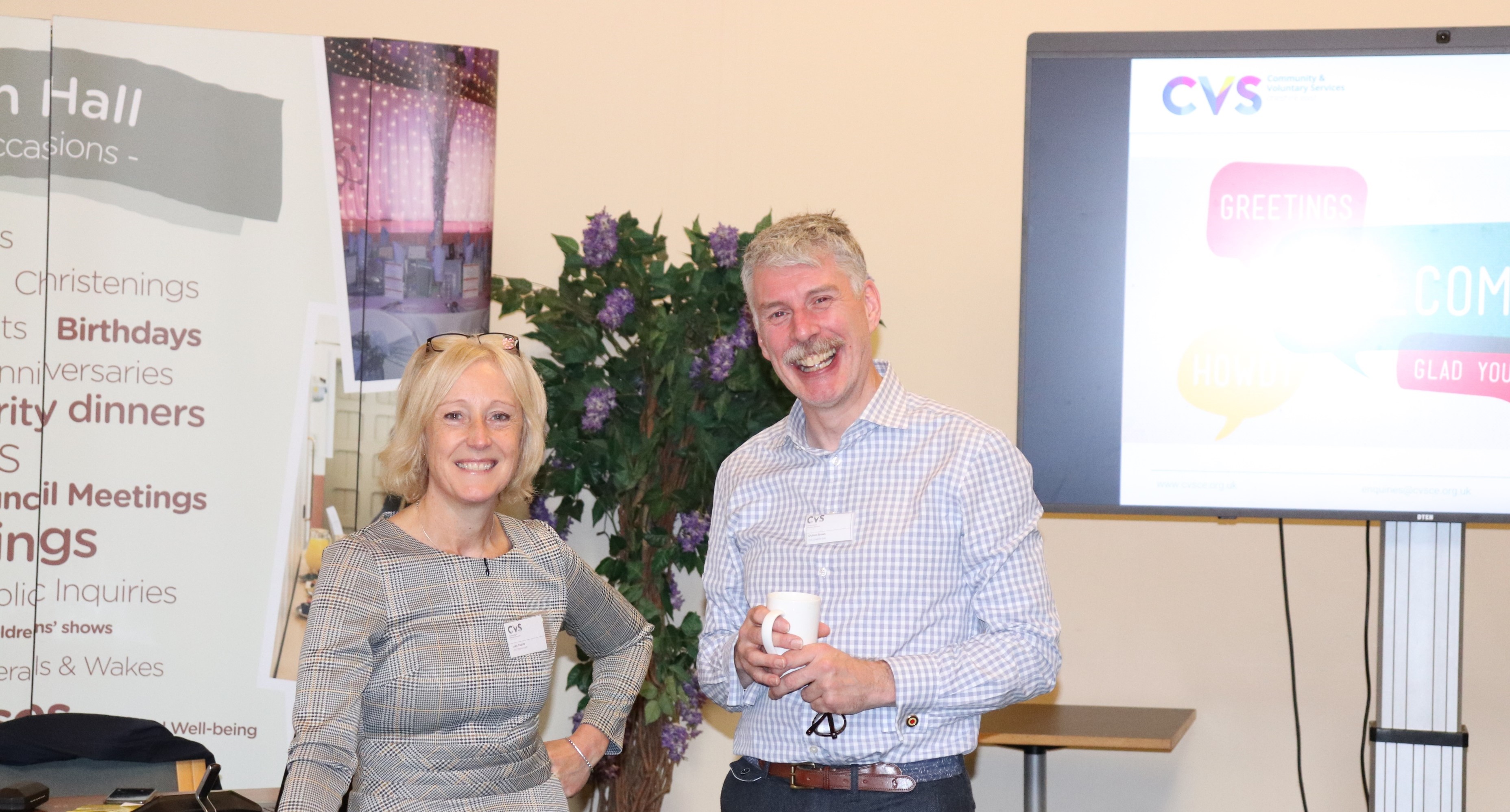 A photograph of Graham Brown and Lucie Ferneyhough smiling at the launch event of the Food Alliance