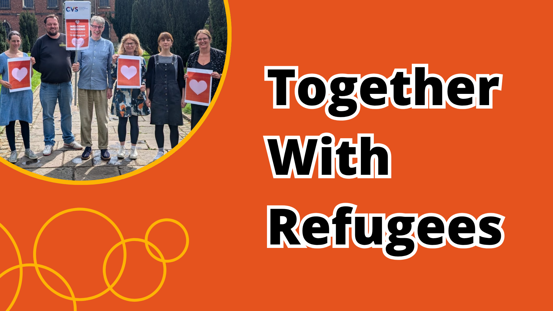 CVSCE Team holding posters on Together with Refugees Banner